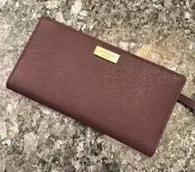 Kate spade maroon wallet with card slots and pockets. NWOT