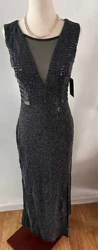 Alexa B fancy going out dress size 4 stretchy black with cut outs slit at the bo