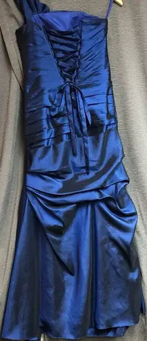 Sapphire blue, one shoulder with a bow on that shoulder, ruching down front