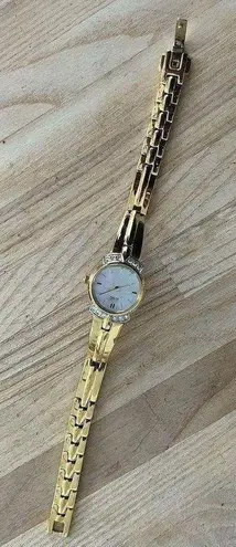 Citizen Eco-Drive Ladies Watch Crystals Pearl Dial Gold Tone Bracelet Solar