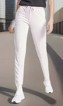 Adidas Women’s Size Medium Tapered Mid Rise Track Pant. Clear Pink. New with Tag