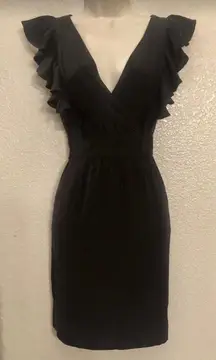 NWT sexy plunging neck  dress. Side pockets. Sz M. Originally $139