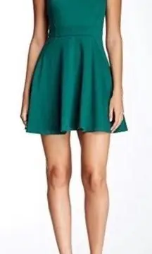 Trina Trina Turk | Melba Solid Ponte Sleeveless Mini Dress in Green