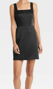NWT Elegant Black Sleeveless structured Satin Mini Dress size 12. Classic modern