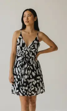 Maurices Black & White Flattering V-Neck Dress with Draping at the front.
