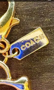 Coach Charm for many things!! (Authentic) GoldUse it for your purse, backpack, keys, bracelet, etc. smoke free home