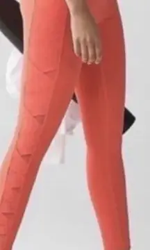 Lululemon Rise and Flow Pant Mesh Criss Cross Size 4 Orange Coral EUC