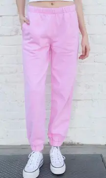 Brandy Melville -THICK AND COZY PINK SWEAT PANTS-SIZE SMALL Super comfy Cotten blend pink sweatpants, has pockets, elastic waistband, like new condition Measurements: Waist: side to side 13-17 inches  Inseam: 28 inches