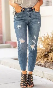 Judy Blue  Distressed Relaxed Fit Jeans with a Raw Hem