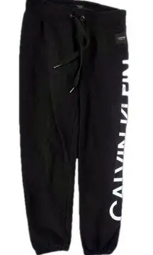 | Calvin Klein | Cuffed Logo Print Drawstring Black Sweatpants Joggers