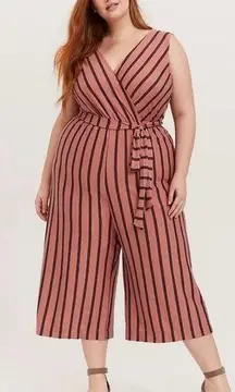 Torrid Jumpsuit with fitted top, sucked in waist/belt with loose, wide bottoms