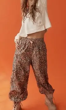 Free People Movement Zephyr Printed Pants Camel Combo Size Large NWOT