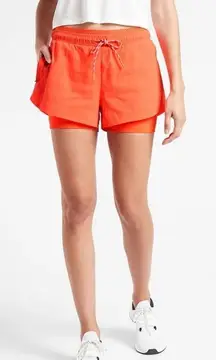Athleta Trekkie Crest 2 in 1 shortie size 8 orange racing red