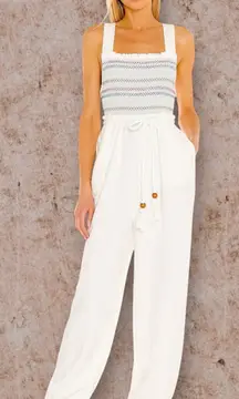 Free People Sienna Smocked Jumpsuit size S, tie back, missing belt, ecru color