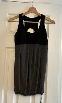 Black and gray tank top with built in sports
bra.Size: 8.