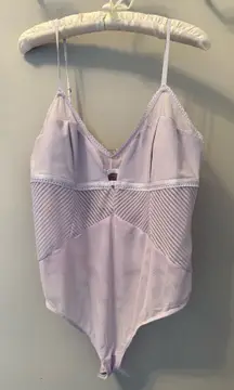 Brand new  Free People intimately bodysuit in color frost lavender. 