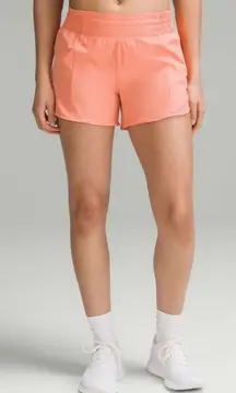 Lululemon Hotty Hot High-Rise Lined Short 4" in Sunny Coral Size 6