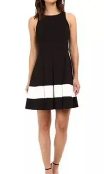 NWOT Karen Kane Black/White Striped Stretch Knit Fit & Flare Dress. Size Medium.