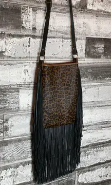 Handmade, Hide on Leopard Print with fringe crossbody purse with adj strap