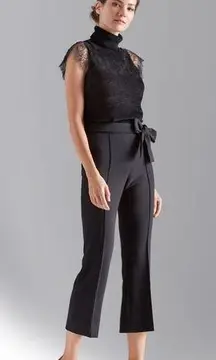 Carlisle | turtle neck blouse with lace sleeves