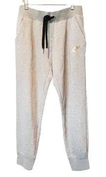 Nike Women's Light Gray Joggers with Black Drawstring size Md