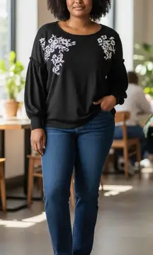 Elegant Black Sweatshirt with White Floral Accents