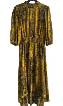 Nanette Lepore Droptail Reptile Black/Yellowgold Dress 
Size 10
100%‎ Polyester
