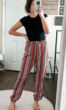 SheIn Silky Black, White, & Orange Tribal Print Capri Cuff Jogger