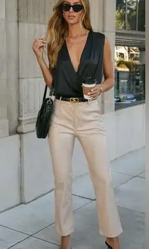 Vici Black Bodysuit with Elegant V-Neck Design