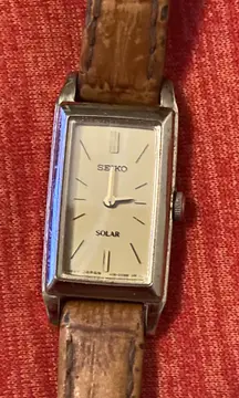 Woman’s gold plate tank style quartz mov water resistant  SOLAR wrist watch