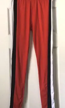 Red Leggings With Black And White Stripes