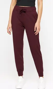 Lululemon On The Fly Jogger Pants Burgundy Women’s Size 8 Travel Stretch 28 In