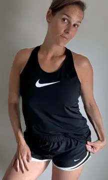 NIKE Running Shorts Mesh Lined Women’s Medium Black White Workout