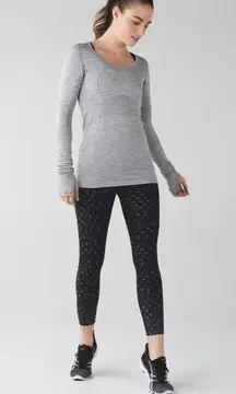 Lululemon  Tight Stuff Tight Reflective Scallop Hem Size 4