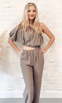 One shoulder, purple jumpsuit from local boutique! Only worn twice, in great condition