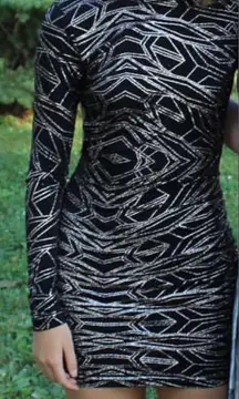 Tight black and sparkly dress