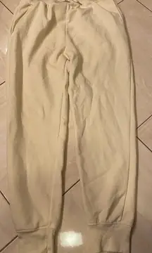 We Wore What cream sweatpants size large