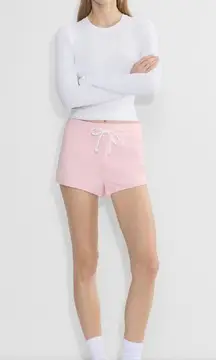 Aritzia TNA rerun shorts villa pink