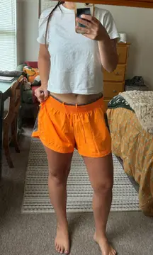 Xersion neon orange running shorts