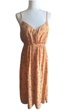 -ORANGE FLORAL MIDI DRESS-SIZE XL Beautiful dress either way adjustable straps, button front, elastic waistband, excellent condition  Measurements: Bust: armpit to armpit 20-24 inches Waistband: side to side 14-20 inches Length: shoulder seam to bottom 49 inches