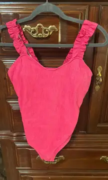 Deep pink ruffle strap one piece.  Size Medium