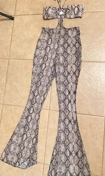 NWOT  SNAKESKIN SHEER JUMPSUIT/ROMPER SMAILL