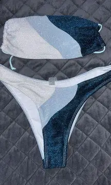 sparkly blue swim suit in perfect condition size medium