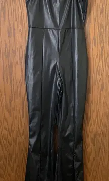 Pretty little thing black strappy split hem flare jumpsuit‎