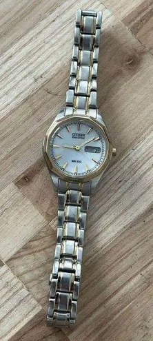 Citizen Eco-Drive Solar Ladies Watch Two Tone Bracelet White Dial Date Window