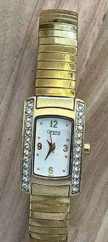 Caravelle by Bulova Ladies Watch Crystals White Dial Gold Tone Stretch Bracelet
