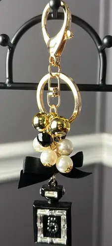 Elegant Black and Gold Keychain/bagcharm with Pearl Accents