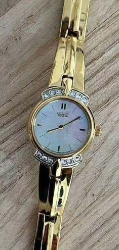 Citizen Eco-Drive Ladies Watch Crystals Pearl Dial Gold Tone Bracelet Solar