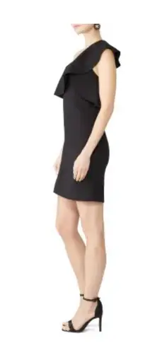 Slate + Willow Sleek one shoulder little black dress Ruffles on the right shoulder .