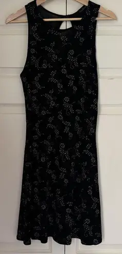 Vintage Y2K stretchy black mini dress with sparkly silver design Size M